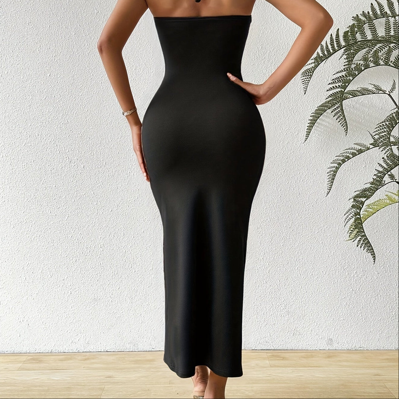 Kvinders sexede sorte ærmeløse bodycon-kjole uden ryg